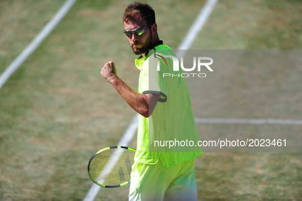 Jerzy Janowicz (POL) cheers during a match against Grigor Dimitrov (BUL) in the round of eight of the Mercedes Cup in Stuttgart, Germany on...