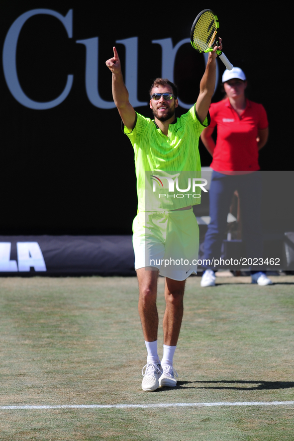 Jerzy Janowicz (POL) cheers after winning against Grigor Dimitrov (BUL) in the round of eight of the Mercedes Cup in Stuttgart, Germany on J...