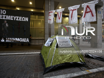 A tent set by protesters at the entrance of  Finance Ministry, in Athens on the evening of June 15, 2017. Public hospitals workers are going...