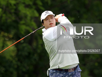 Shanshan Feng of China tees off on the 8th tee during the second round of the Meijer LPGA Classic golf tournament at Blythefield Country Clu...