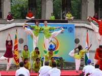 Participants perform an advanced Yoga sequence during an event to mark the International Yoga Day at the Independence Square, Colombo, Sri L...