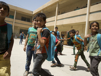 School children at a school in East Mosul, at Al-hashimiyah Primary School on 16 June 2017. Life is returning to East Mosul and children onc...