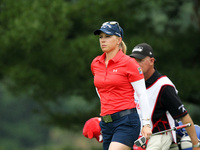 Morgan Pressel of the United States and caddie walk on the fairway of the second hole during the third round of the Meijer LPGA Classic golf...