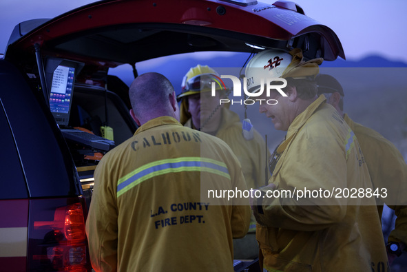 Los Angeles County firefighters during the Castaic Lake fire in Castaic, California on June 17, 2017. Castaic, California on June 17, 2017....