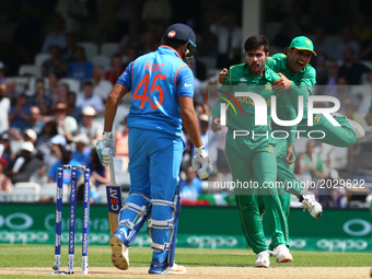 Muhammad Amir of Pakistan gets LBW on Rohit Shama of India
during the ICC Champions Trophy Final match between India and Pakistan at The Ova...