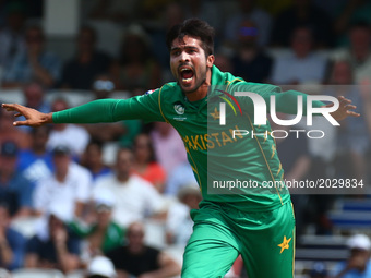 Muhammad Amir of Pakistan celebrate the wicket of Shikhar Dhawan of India
during the ICC Champions Trophy Final match between India and Paki...