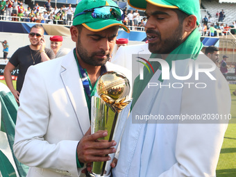 L-R Babar Azam and Haris Sohail of Pakinstan with Trophy
during the ICC Champions Trophy Final match between India and Pakistan at The Oval...