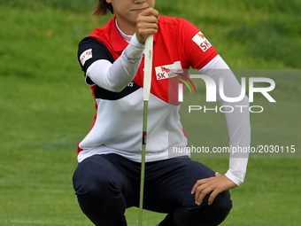 Na Yeon Choi of the Republic of Korea liines up her putt on the 7th green during the final round of the Meijer LPGA Classic golf tournament...