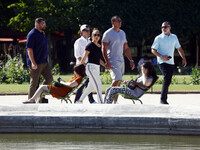 Jennifer Lopez and Her boyfriend Alex Rodriguez walk through the park of Jardin des Tuileries and seen taking pictures with the Pyramide of...