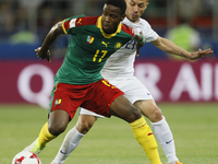 Arnaud Djoum (L) of Cameroon national team and Marcelo Diaz of Chile national team during the Group B - FIFA Confederations Cup Russia 2017...