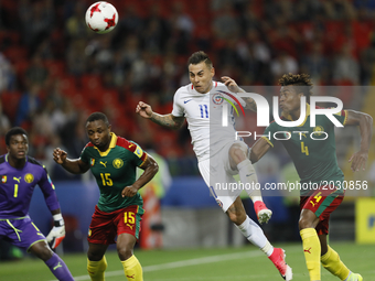 (L to R) Fabrice Ondoa of Cameroon national team, Sebastien Siani of Cameroon national team, Eduardo Vargas of Chile national team and Adolp...