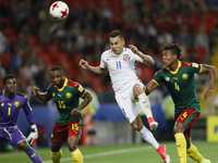 (L to R) Fabrice Ondoa of Cameroon national team, Sebastien Siani of Cameroon national team, Eduardo Vargas of Chile national team and Adolp...