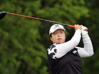 Shanshan Feng of China follows her shot from the 8th tee during the final round of the Meijer LPGA Classic golf tournament at Blythefield Co...