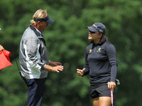 Wichanee Meechai of Thailand with LPGA rules official at the 7th green during the final round of the Meijer LPGA Classic golf tournament at...