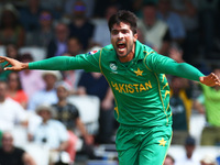 Muhammad Amir of Pakistan celebrate the wicket of Shikhar Dhawan of India
during the ICC Champions Trophy Final match between India and Paki...