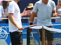 Britain's Andy Murray  having a joke with Thanasi Kokkinakis of Australiaduring a practice match on the first day of the ATP Aegon Champions...