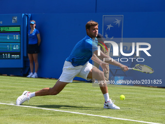 Ryan Harrison USA against Grigor Dimitrov BUL during Round One match on the first day of the ATP Aegon Championships at the Queen's Club in...