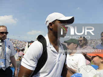 Donald Young (USA) after winning against Nick Kyrgios (AUS) in the first round of AEGON Championships at Queen's Club, due to Kyrgios' retir...