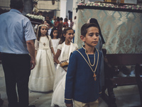 Parishioners walked with the prosecion of the Corpus Christi in Cazalla de la Sierra a19 of June of 2107.  In a village in the mountains of...