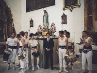Parishioners walked with the prosecion of the Corpus Christi in Cazalla de la Sierra a19 of June of 2107.  In a village in the mountains of...