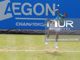James Ward  (GBR)   against Julien Benneteau  (FRA)  during Round One match on the second day of the ATP Aegon Championships at the Queen's...