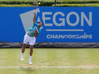 James Ward  (GBR)   against Julien Benneteau  (FRA)  during Round One match on the second day of the ATP Aegon Championships at the Queen's...