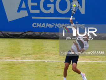 Julien Benneteau  (FRA) against James Ward  (GBR)  during Round One match on the second day of the ATP Aegon Championships at the Queen's Cl...