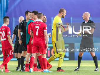 Vanja Milinkovic-Savic (SRB), talks to referee Bobby Madden during the UEFA European Under-21 Championship Group C match between Czech Repub...