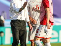 Coach Blagoja Milevski  (MKD), Egzon Bejtulai (MKD), Aleksa Amanovic (MKD) during the UEFA European Under-21 Championship Group C match betw...