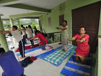 Nepalese yoga enthusiast people performing Yoga Position during the celebration of International Day of Yoga organized by Yog Sadhana Samaj...