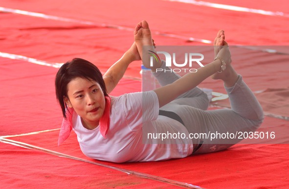 A participant performs a Yoga session to mark International Yoga Day in Dimapur, India north eastern state of Nagaland on Wednesday, 21 June...
