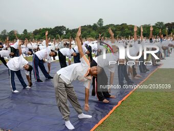 Members of National Cadet Corps (NCC)  participated in a mega yoga event on the eve of International Day of Yoga on the Brigade Parade Groun...