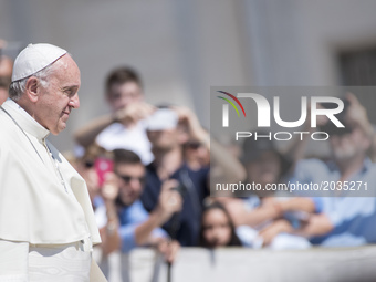 Pope Francis smiles as he arrives at the end of his Weekly General Audience in St. Peter's Square in Vatican City, Vatican on June 21, 2017....