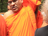 Sri Lankan Buddhist monk Galagodaatte Gnanasara leaves after obtaining bail following his surrender to a magistrate in Colombo, Sri Lanka, W...