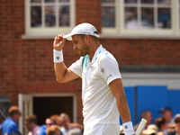 Gilles Muller (LUX) after winning against Jo-Wilfried Tsonga (FRA) in the second round of AEGON Championships at Queen's Club, London, on Ju...