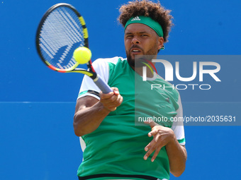 Jo-Wilfried Tsonga FRA against Gilles Muller LUX during Round Two match on the third day of the ATP Aegon Championships at the Queen's Club...
