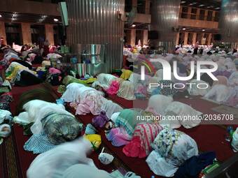 Muslim from all over Indonesia and some country gathered in early morning to pray tahajjud hoping for lailatul qadr (the night that is bette...