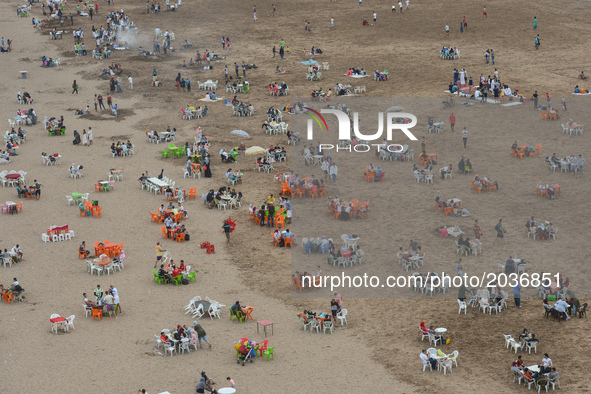 People praparing for Iftar, a meal after the sunset, consumed on  Rabat beach, in Rabat, Morocco on June 21, 2017.
Laylat al-Qadr, or Night...
