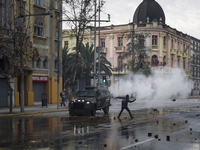 Led by the Confederation of Chilean Students (CONFECH), the march for universal education ends in a clash with police in Santiago on June 21...