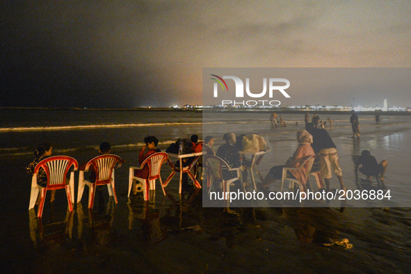 Families after Iftar, a meal after the sunset, consumed on  Rabat beach, in Rabat, Morocco on June 21, 2017.
Laylat al-Qadr, or Night of Des...