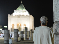A Moroccan worshiper prays during Laylat al-Qadr outside the Mausoleum of Mohammed V
in Rabat.  
Laylat al-Qadr, or Night of Destiny, which...