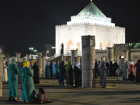 Moroccan worshipers pray during Laylat al-Qadr outside the Mausoleum of Mohammed V
in Rabat.  
Laylat al-Qadr, or Night of Destiny, which fa...