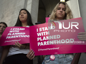 Supporters of Planned Parenthood gather to call on Congress not to ban people on Medicaid from receiving care at Planned Parenthood health c...