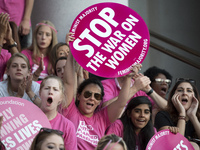 Supporters of Planned Parenthood gather to call on Congress not to ban people on Medicaid from receiving care at Planned Parenthood health c...