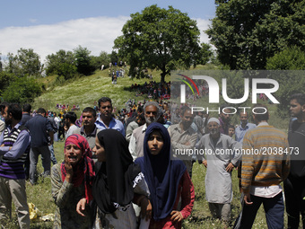 kashmiri Villagers Gather during the Funeral procession  of Tauseef Ahmed,A civilian in Tengpun, (25 miles) south of Srinagar, Indian Admini...