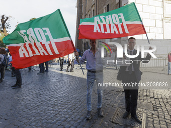 Supporters of political party Forza Italia (Go, Italy!) take part in a rally to protest against Rome's Mayor Virginia Raggi in Rome, Italy o...