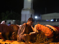 Palestinian Muslim worshippers pray overnight on July 22, 2017 at a Mosque in Gaza city on the occasion of Laylat al-Qadr which falls on the...