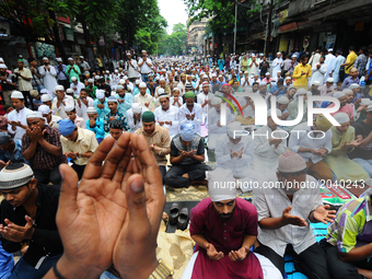 Indian Muslims offer prayers on the last congregational Friday of the holy month of Ramadan, following the Muslim Festival Eid al-Fitr ,the...