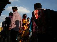 On 23 June 2017 in Dhaka, bangladeshi passengers travel in an overcrowded trains and launch as they head home ahead of Eid ul-Fitr. A large...