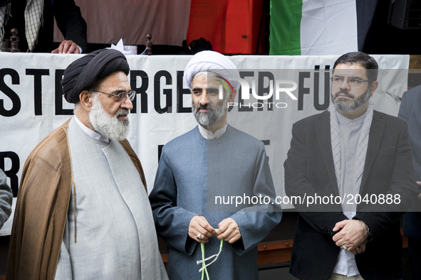 Imam Hamid Reza Torabi (C) and other clerics attend an Al-Quds-Day demonstration in Berlin, Germany on June 23, 2017. 